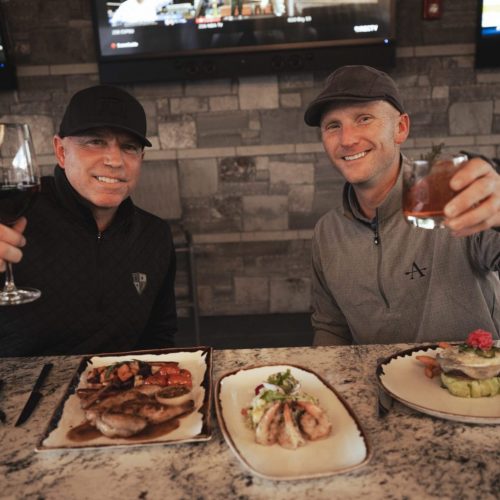 Members enjoy a meal at The Club at ArrowCreek