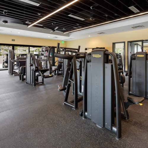 Weight racks at the  fitness center at The Club at ArrowCreek